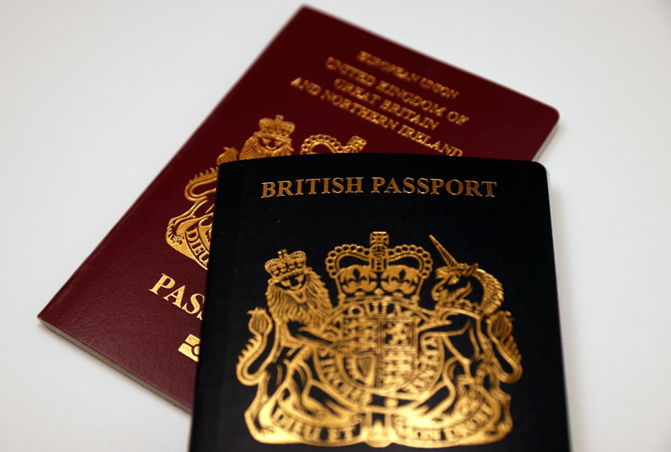 Current and previous European Union versions of British passports are seen in this illustration photograph taken December 11, 2020. REUTERS/John Sibley/Illustration