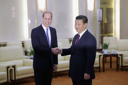 Britain's Prince William meets China's President Xi Jinping at the Great Hall of the People in Beijing March 2, 2015. REUTERS/Feng Li/Pool