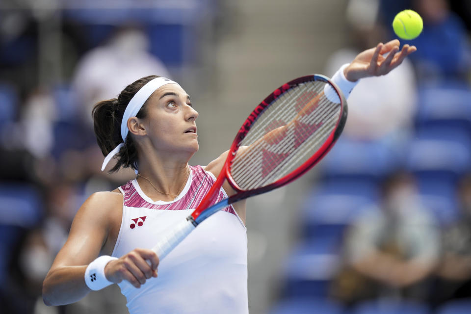 Caroline Garcia of France serves a ball against Zhang Shuai of China during a singles match in the Pan Pacific Open tennis tournament at Ariake Colosseum Wednesday, Sept. 21, 2022, in Tokyo. (AP Photo/Eugene Hoshiko)