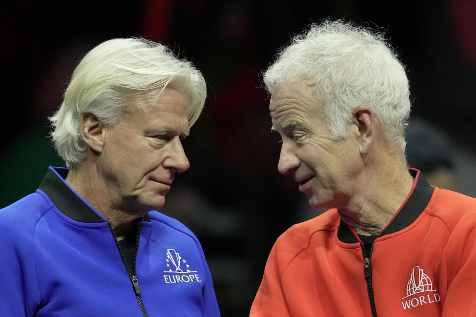 FILE - Team Europe's Captain Bjorn Borg, left, chats with Team World's captain John McEnroe, on the second day of the Laver Cup tennis tournament at the O2 in London, Saturday, Sept. 24, 2022. John McEnroe and Bjorn Borg will return as Laver Cup captains this year, when the men’s tennis team event moves to Canada for the first time.(AP Photo/Kin Cheung, File)