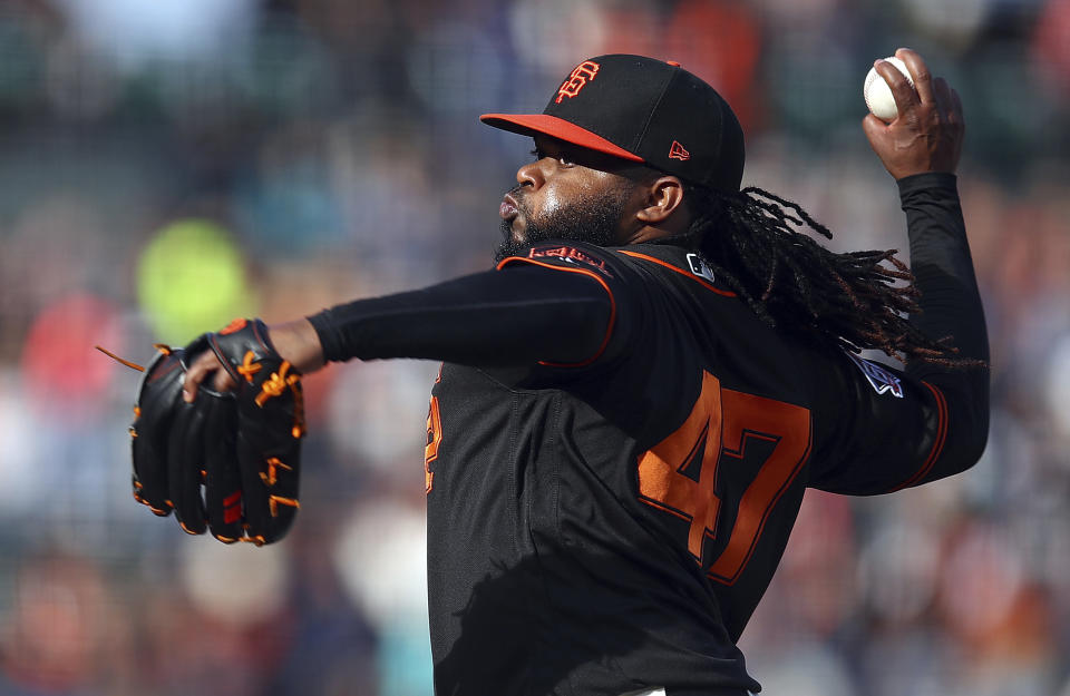 FILE - In this July 28, 2018, file photo, San Francisco Giants pitcher Johnny Cueto works against the Milwaukee Brewers in the first inning of a baseball game in San Francisco. Cueto is scheduled to throw next week for the first time since undergoing Tommy John reconstructive surgery in August. (AP Photo/Ben Margot, File)
