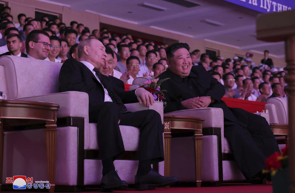 In this photo provided by the North Korean government, Russian President Vladimir Putin, left, and North Korea's leader Kim Jong Un attend a gala concert in Pyongyang, North Korea, Wednesday, June 19, 2024. The content of this image is as provided and cannot be independently verified. Korean language watermark on image as provided by source reads: "KCNA" which is the abbreviation for Korean Central News Agency. (Korean Central News Agency/Korea News Service via AP)