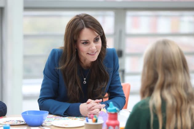 Kate Middleton Matches Pink Pumps With Pink Power Suit in London