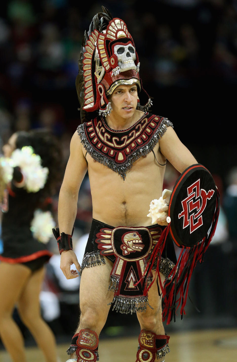 SPOKANE, WA - MARCH 20:  San Diego State Aztecs mascot Aztec Warrior performs during the game against the New Mexico State Aggies in the second round of the 2014 NCAA Men's Basketball Tournament at Spokane Veterans Memorial Arena on March 20, 2014 in Spokane, Washington.  (Photo by Stephen Dunn/Getty Images)