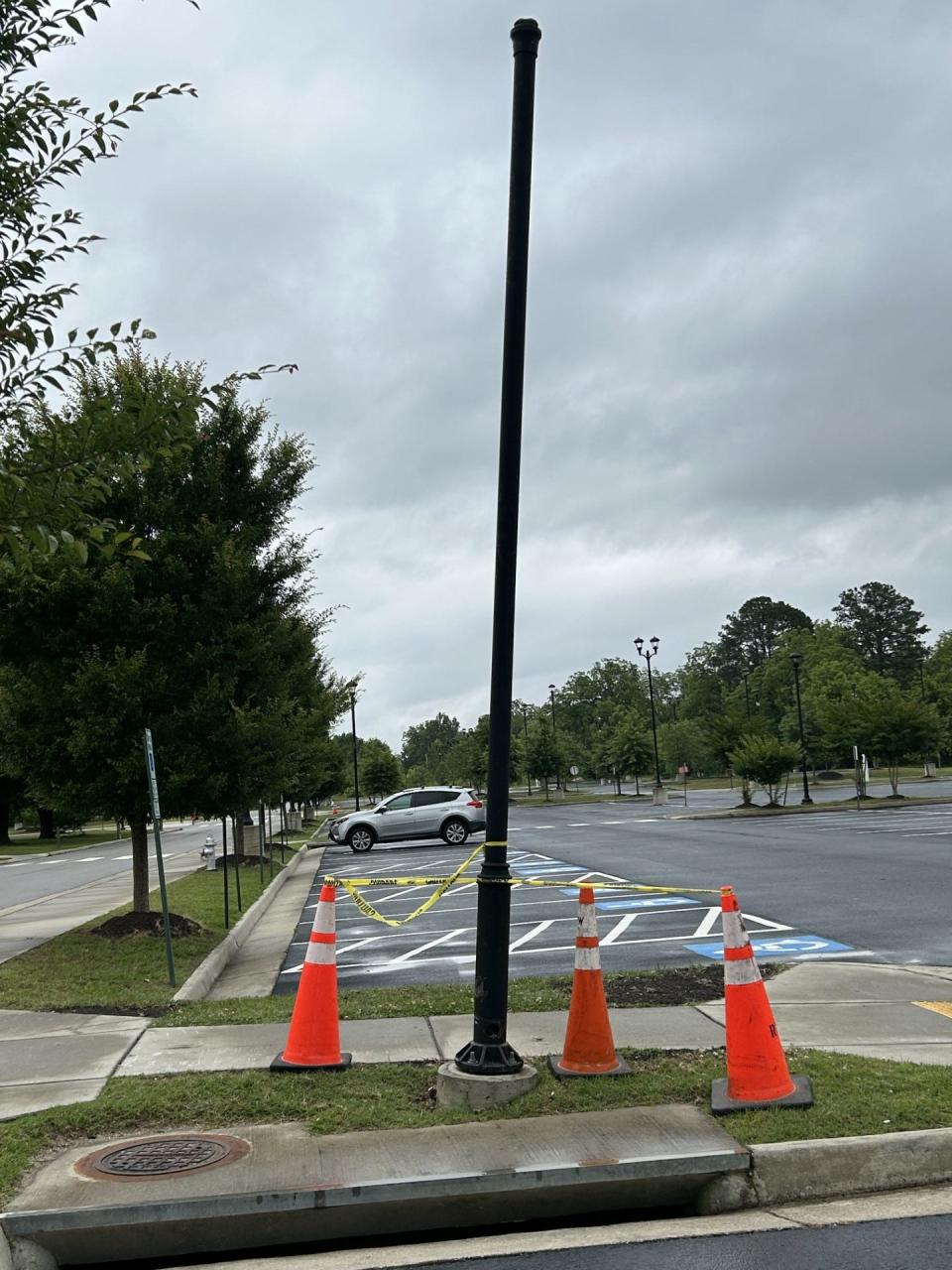 A light pole at the Virginia State University Multi-Purpose Center is askew as the result of being hit by a bulldozer Saturday, May 27, 2023.