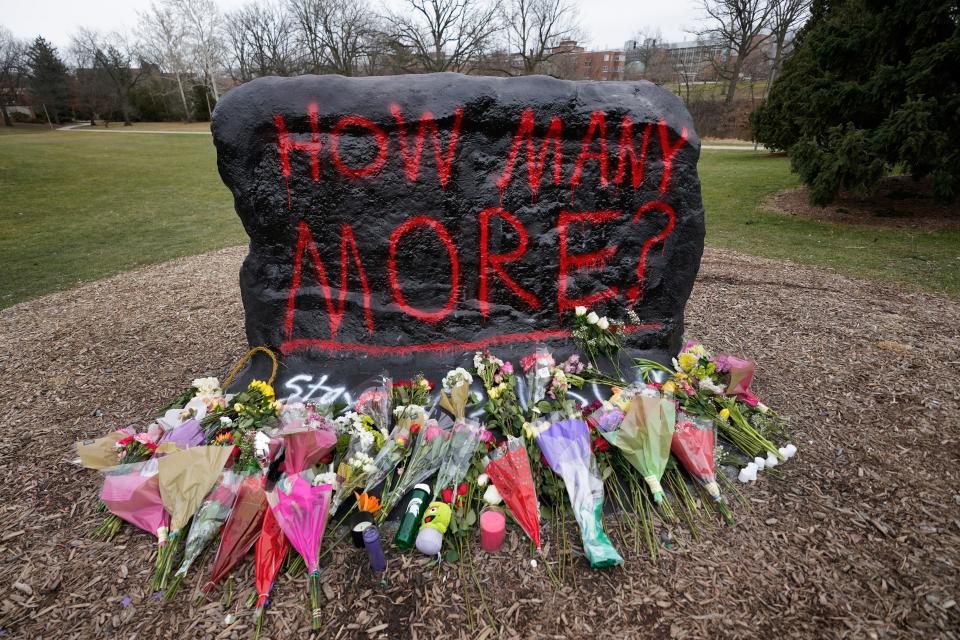 Flowers are displayed at The Rock on the grounds of Michigan State University, in East Lansing, Michigan.