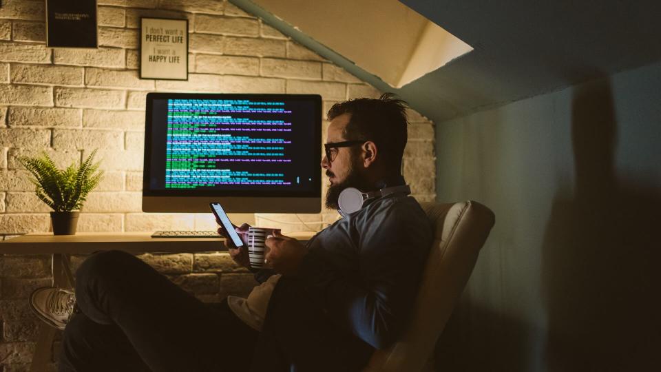 Programmer working late in his office.