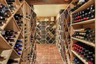 <p>Its <em>Wine Spectator</em>-recognized cellar features more than 400 fine wines from around the world, and the ranch has a signature wine brand of its own.</p>