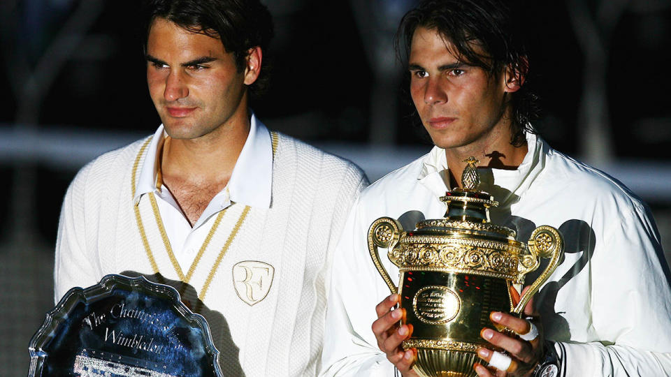 Roger Federer and Rafael Nadal at Wimbledon in 2008.  (Photo by Julian Finney/Getty Images)