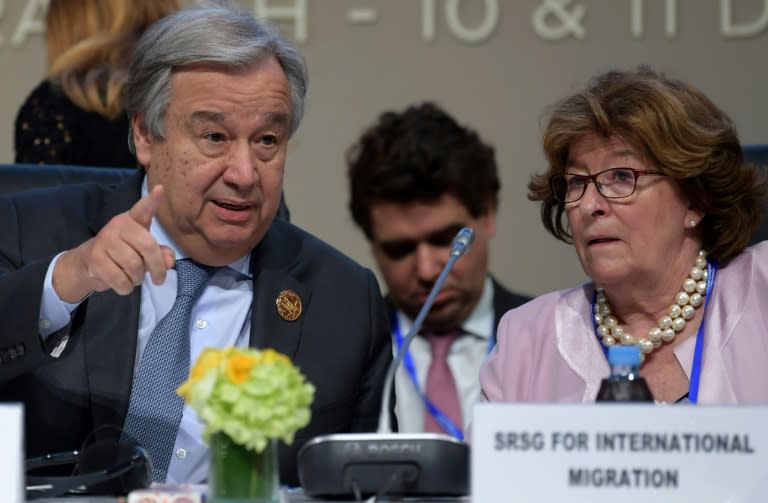 UN Secretary General Antonio Guterres sits next to Louise Arbour, his special representative for migration, during the United Nations conference on migration on December 10, 2018 in the Moroccan city of Marrakesh