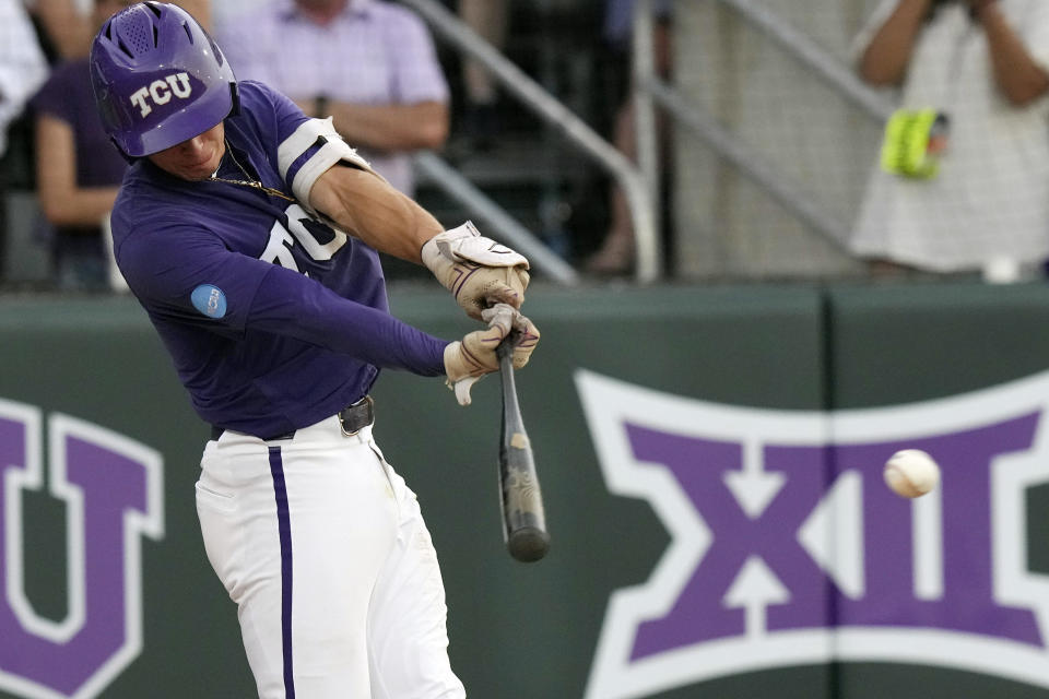 TCU's Anthony Silva hits a single scoring teammate Tre Richardson during the forth inning of an NCAA college baseball super regional game against Indiana State in Fort Worth, Texas, Saturday, June 10, 2023. (AP Photo/LM Otero)