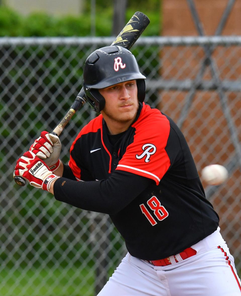 ROCORI's Brady Blattner takes a pitch during the game Tuesday, May 31, 2022, in Cold Spring.