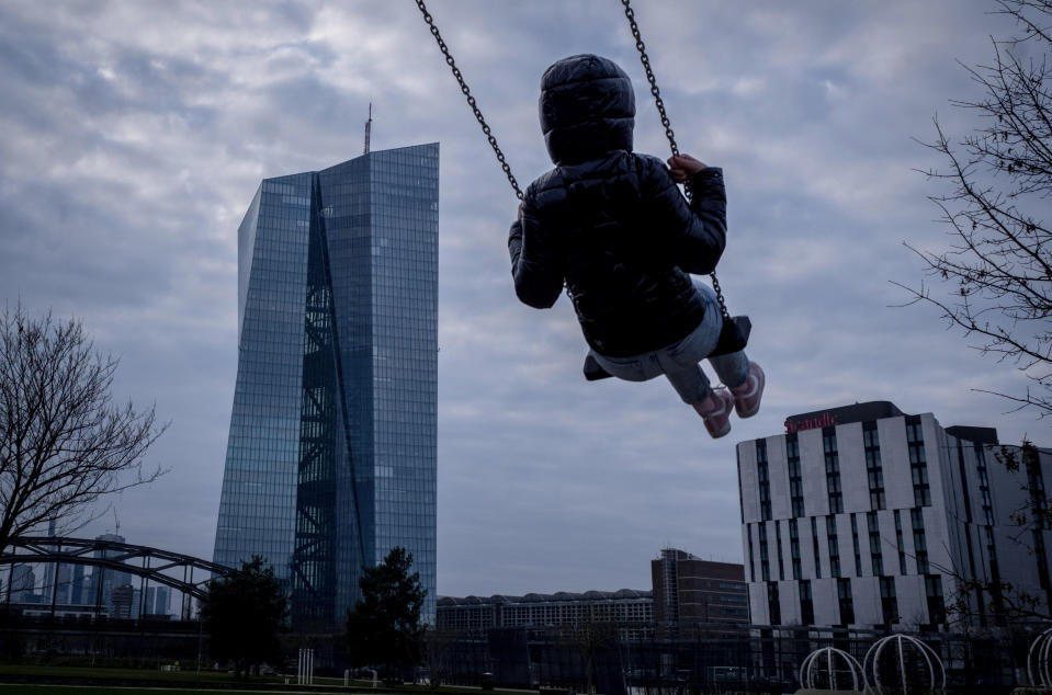 A girl swings near the European Central Bank in Frankfurt, Germany, Wednesday, March 6, 2024. The governing council of the ECB will meet on Thursday. (AP Photo/Michael Probst)