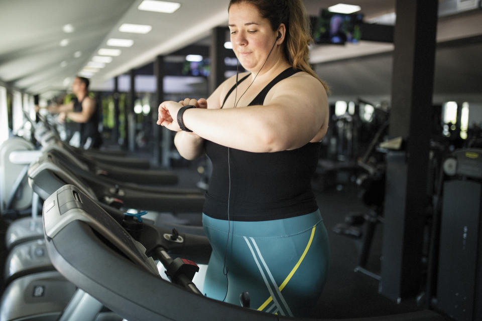 Woman on treadmill at gym