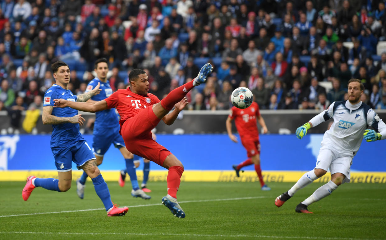 Serge Gnabry scores the opener during Bayern Munich's four-goal first half vs. Hoffenheim. (Photo by Matthias Hangst/Bongarts/Getty Images)