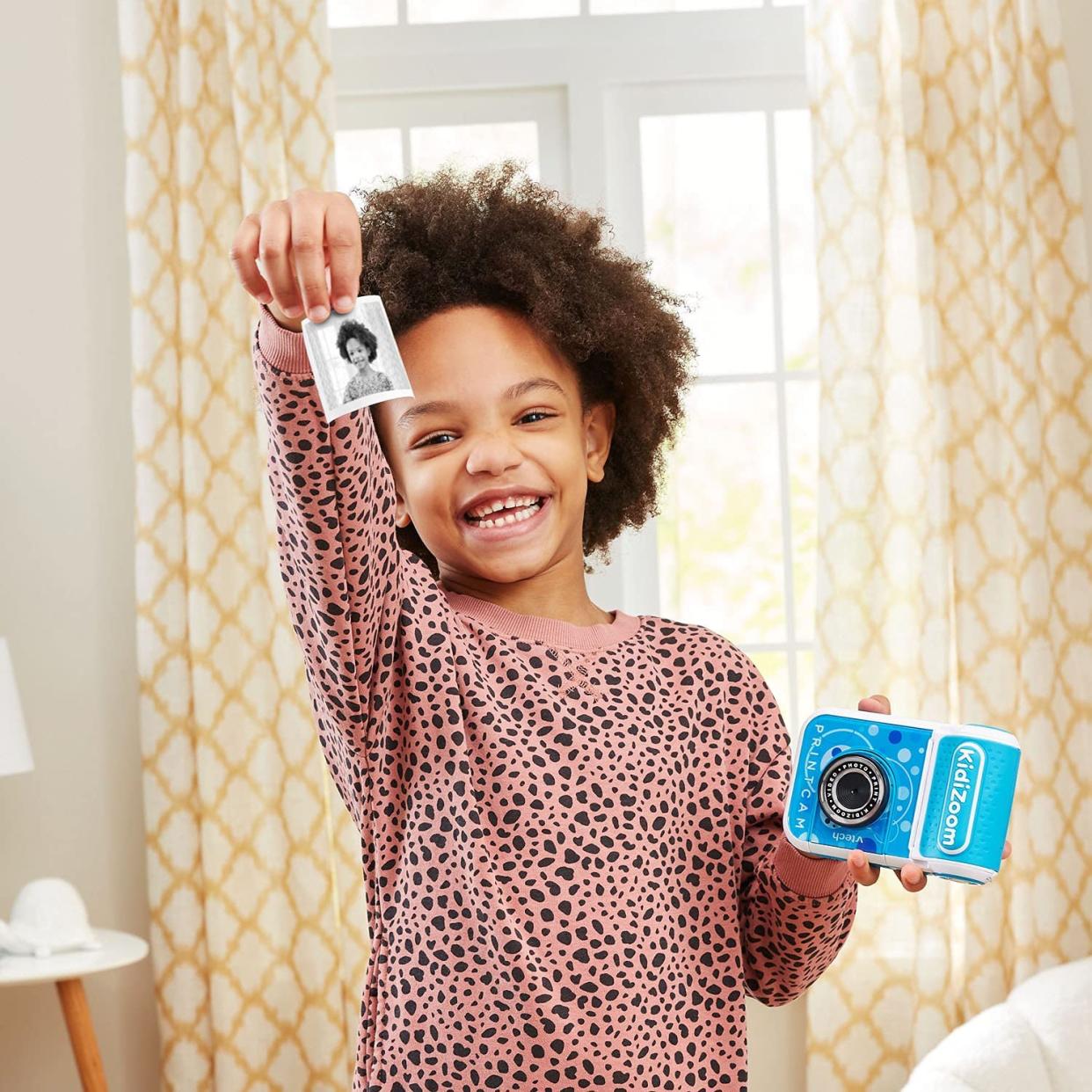 "It's me!" Look at the joy this gift brings — priceless. (Photo: VTech)