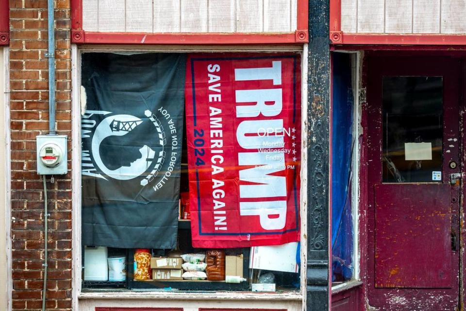 A Trump flag hangs inside a business in downtown Jackson, Ky., in Breathitt County, Wednesday, July 17, 2024.