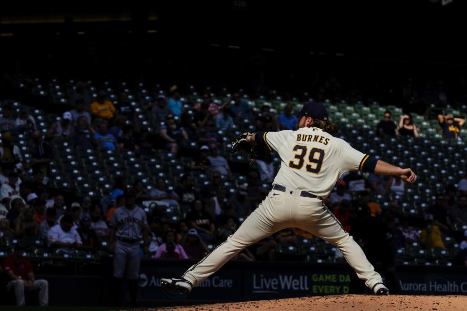 Milwaukee Brewers starting pitcher Corbin Burnes throws during the third inning of game 1 of a doubleheader baseball game against the San Francisco Giants Thursday, Sept. 8, 2022, in Milwaukee. (AP Photo/Morry Gash)