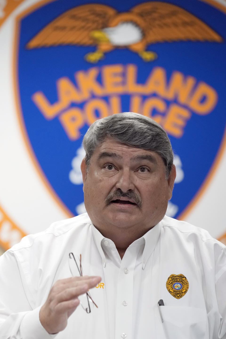 Lakeland Police Chief Sam Taylor gestures as he speaks during a news conference Tuesday, Jan. 31, 2023, in Lakeland, Fla. Police say several people were shot and wounded during a drive-by shooting in a central Florida neighborhood. (AP Photo/Chris O'Meara)