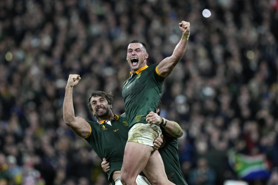 South Africa's Jesse Kriel, right, and South Africa's Eben Etzebeth celebrate after the Rugby World Cup final match between New Zealand and South Africa at the Stade de France in Saint-Denis, near Paris Saturday, Oct. 28, 2023. South Africa won the match 12-11. (AP Photo/Thibault Camus)