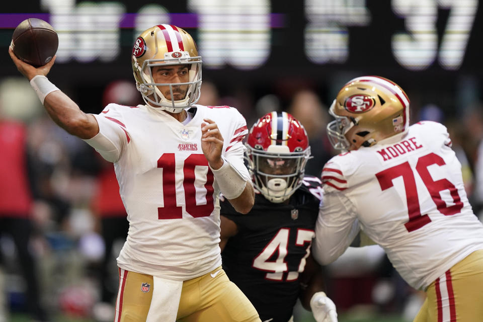 San Francisco 49ers quarterback Jimmy Garoppolo (10) works in the pocket against the Atlanta Falcons during the first half of an NFL football game, Sunday, Oct. 16, 2022, in Atlanta. (AP Photo/Brynn Anderson)
