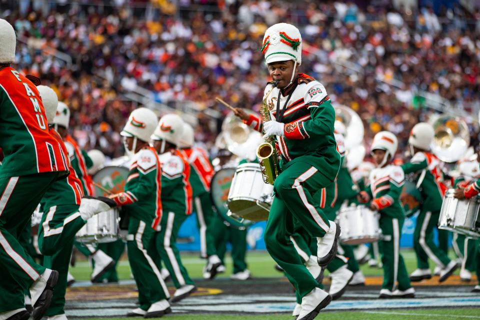 The FAMU Marching 100 perform for fans during the halftime show at the Florida Classic on Saturday, Nov. 19, 2022.