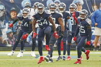 Tennessee Titans inside linebacker Rashaan Evans (54) celebrates after making a stop against the Houston Texans in the second half of an NFL football game Sunday, Oct. 18, 2020, in Nashville, Tenn. (AP Photo/Wade Payne)