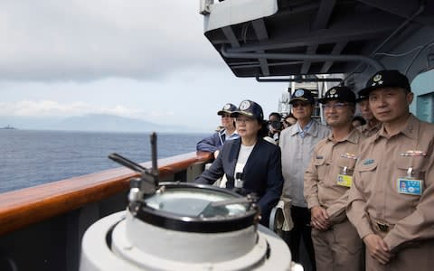 Taiwan's President Tsai Ing-wen, second from left, inspects on a Kidd-class destroyer during a navy exercise in the northeastern port of Su'ao in Yilan County, Taiwan, Friday, April 13 - Credit: Military News Agency