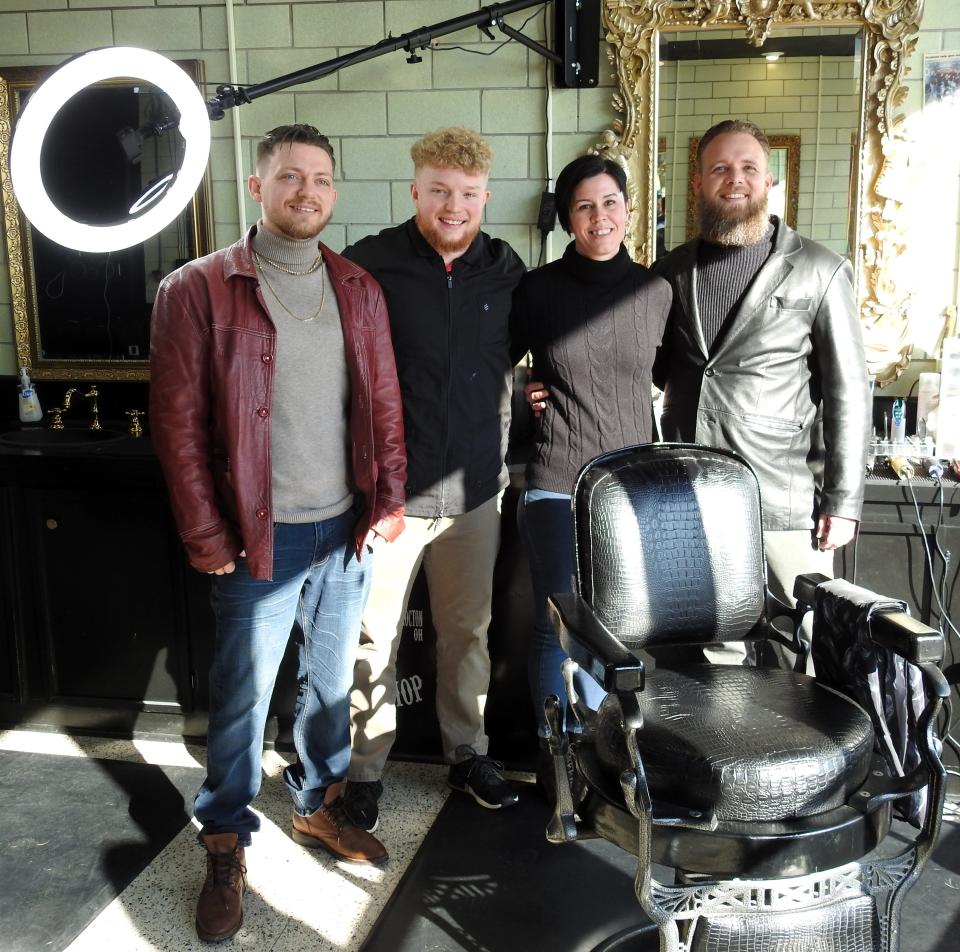 Brandon Selders, Kobe Rust, Erin Romine and Jay West at the new Locals Barbershop Downtown.