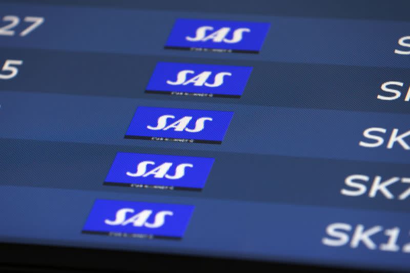 Scandinavian Airlines (SAS) flights are seen listed at Copenhagen Airport Kastrup in Copenhagen