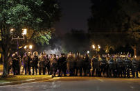 <p>Police line up as protesters gather, Friday, Sept. 15, 2017, in St. Louis, after a judge found a white former St. Louis police officer, Jason Stockley, not guilty of first-degree murder in the death of a black man, Anthony Lamar Smith, who was fatally shot following a high-speed chase in 2011. (Photo: Jeff Roberson/AP) </p>