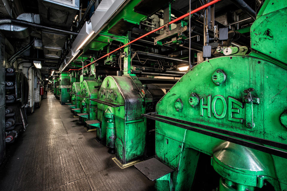 Stop the presses! Photographer documents newspaper’s eerie abandoned printing presses.