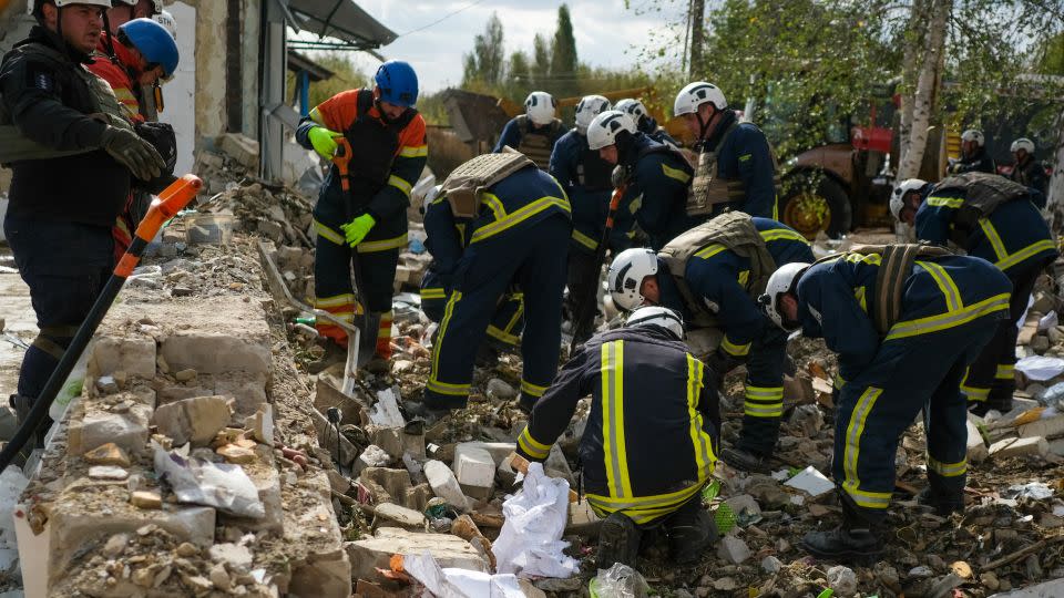 Emergency services continued search and rescue operations on Friday, but they said they had no hope of finding any survivors. - Vasco Cotovio/CNN