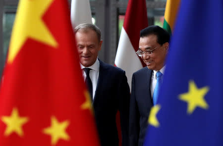 Chinese Premier Li Keqiang and European Council President Donald Tusk arrive ahead of a EU-China summit in Brussels, Belgium April 9, 2019. REUTERS/Yves Herman