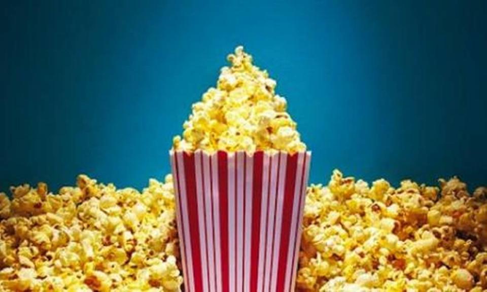 You can’t eat popcorn or candy or drink a soda while watching a movie at movie theaters in Miami-Dade during the COVID-19 pandemic.