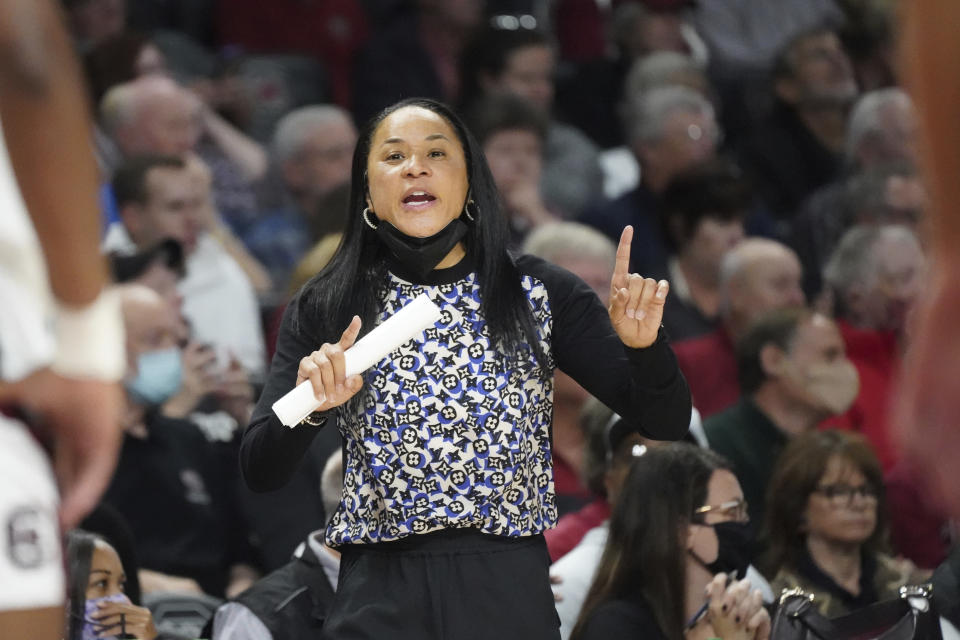 South Carolina head coach Dawn Staley communicates with players during the second half of an NCAA college basketball game against Maryland Sunday, Dec. 12, 2021, in Columbia, S.C. (AP Photo/Sean Rayford)