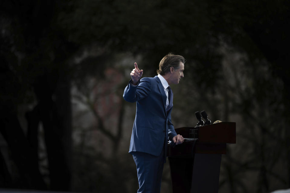 CORRECTS SPELLING OF SURNAME TO NEWSOM - Governor Gavin Newsom speaks during his inauguration in the Plaza de California in Sacramento, Calif., Friday, Jan. 6, 2023. (AP Photo/José Luis Villegas)