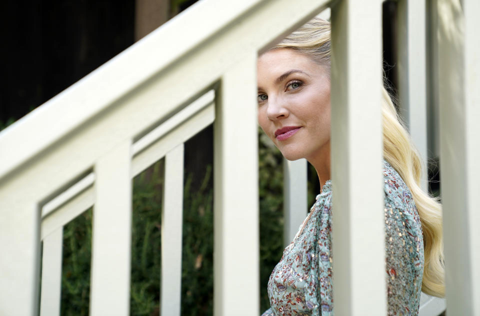 Amanda Kloots, co-host of the daytime talk show "The Talk" and co-author of the new memoir "Live Your Life: My Story of Loving and Losing Nick Cordero," poses for a portrait at home in Los Angeles on June 8, 2021. (AP Photo/Chris Pizzello)