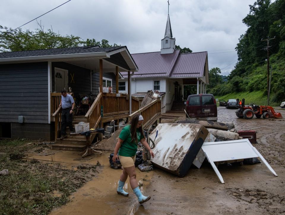 Flash flooding swept through mountain valleys in eastern Kentucky in July 2022, killing more than three dozen people. It was one of several destructive flash floods. <a href="https://www.gettyimages.com/detail/news-photo/local-fire-chief-and-his-daughter-drop-off-goods-for-a-news-photo/1242236541" rel="nofollow noopener" target="_blank" data-ylk="slk:Seth Herald/AFP via Getty Images;elm:context_link;itc:0;sec:content-canvas" class="link ">Seth Herald/AFP via Getty Images</a>