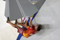 Alberto Gines Lopez, of Spain, competes during the bouldering portion of the men's sport climbing final at the 2020 Summer Olympics, Thursday, Aug. 5, 2021, in Tokyo, Japan. (AP Photo/Jeff Roberson)