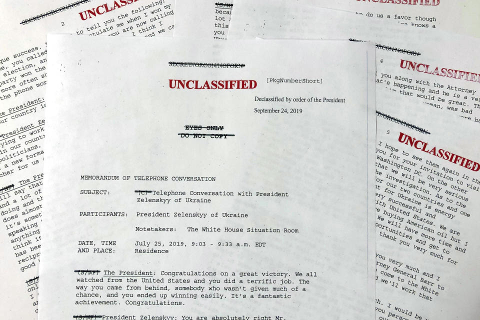 FILE - In this Sept. 25, 2019, file photo, a White House-released memorandum of President Donald Trump's July 25, 2019, telephone conversation with Ukraine's newly elected president Volodymyr Zelenskiy is photographed in Washington. If there was one day that crystallized all the forces that led to the impeachment investigation of President Donald Trump, it was July 25. That was the day of his phone call with Ukraine’s new leader, pressing him for a political favor. (AP Photo/Wayne Partlow, File)