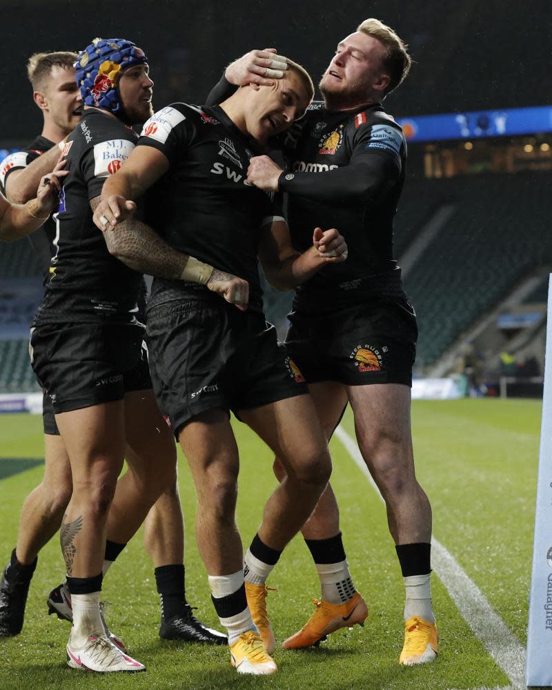 Henry Slade is congratulated after scoring Exeter’s try