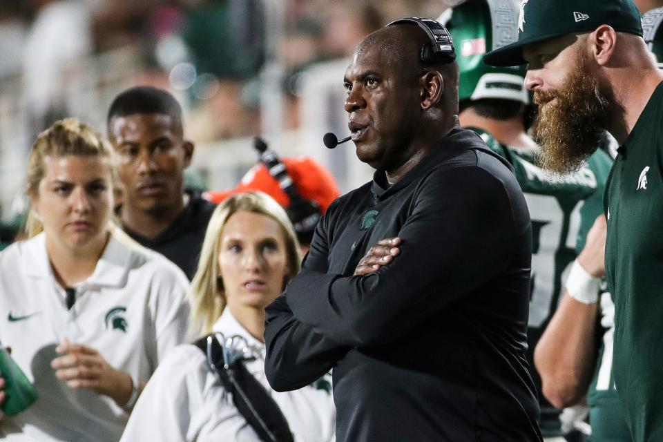 Tucker watches a play during the Spartans' game against Central Michigan at Spartan Stadium in East Lansing on Sept. 1.