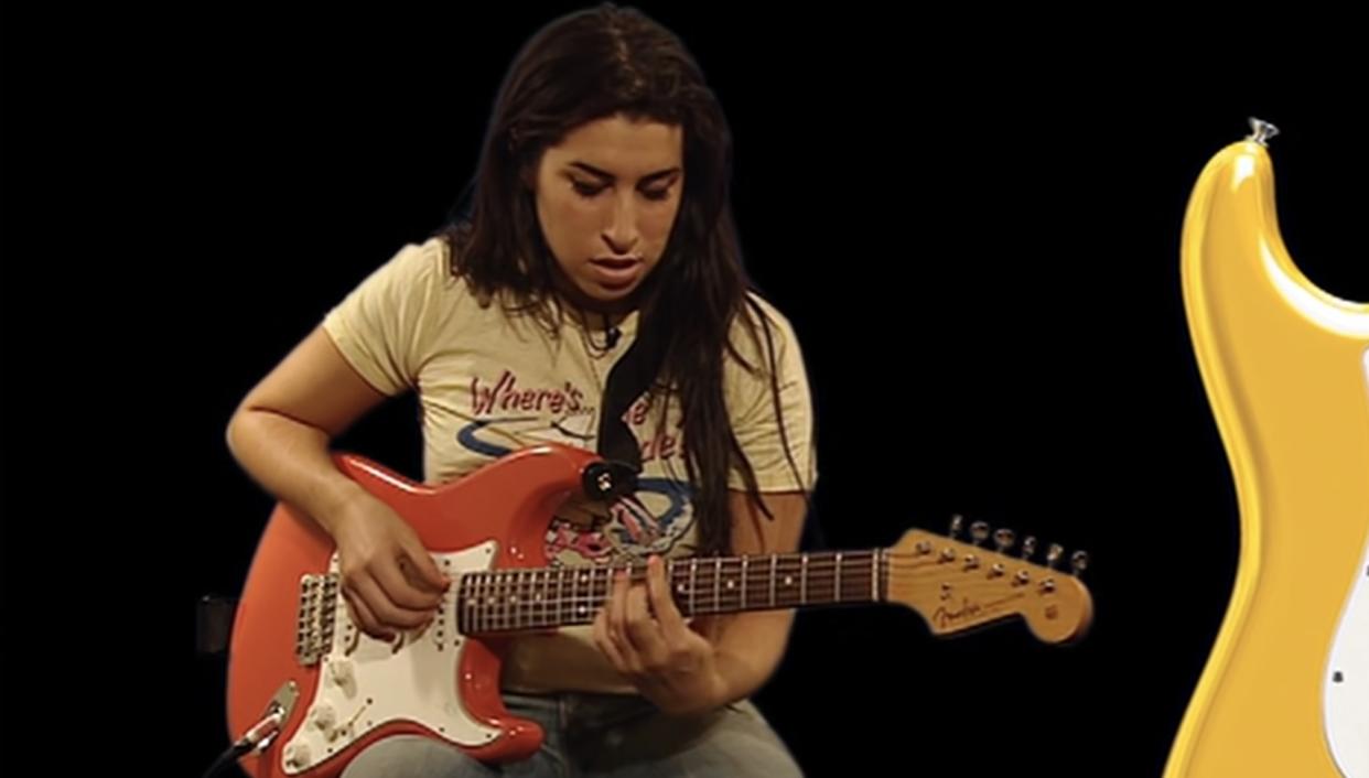  Amy Winehouse plays a Fender Stratocaster in a 2004 Fender promo 