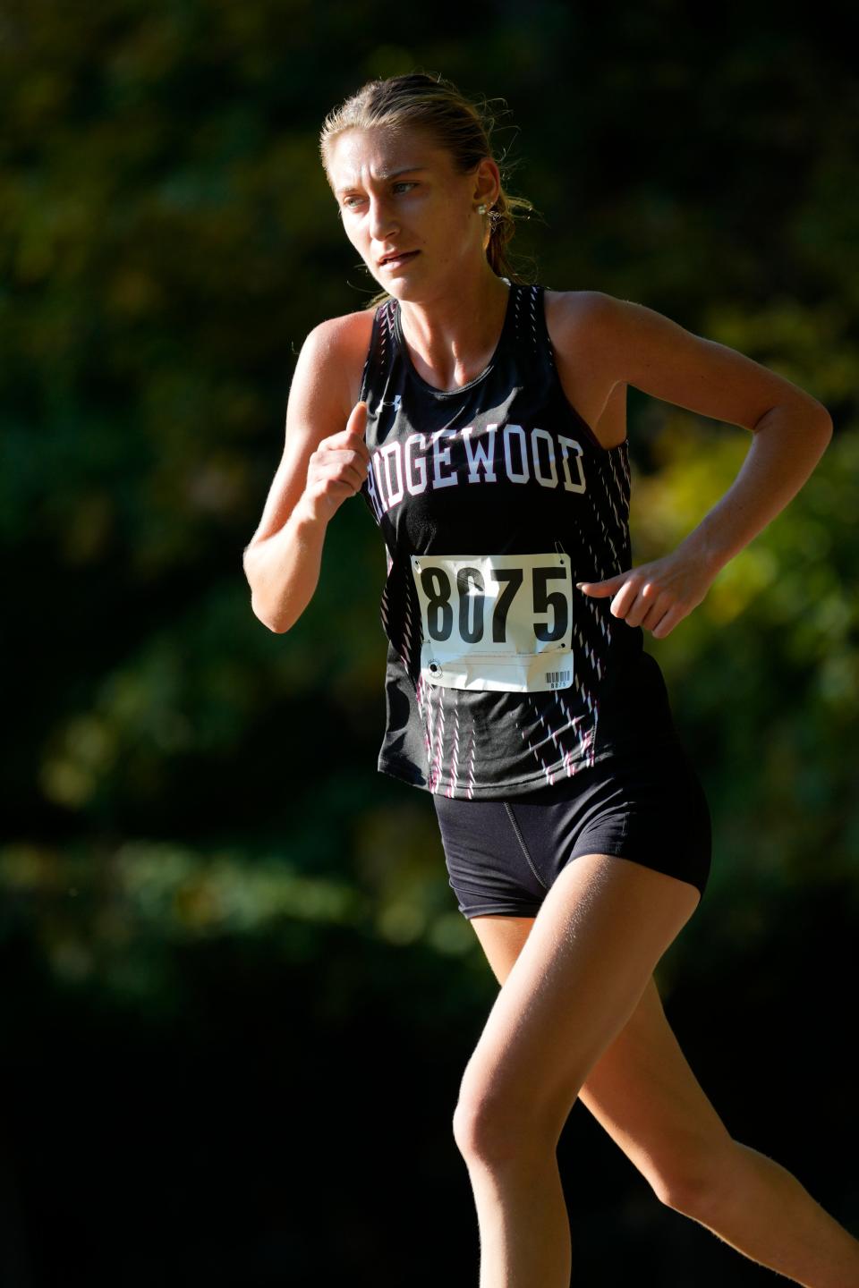 Avery Sheridan, of Ridgewood, is shown on her way to a seventh place finish at the Big North Freedom Cross Country Championships, in Mahwah, Monday, October 2, 2023.