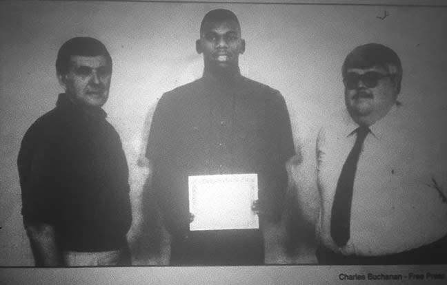 From the June 9, 1991 Free Press: STACKHOUSE HONORED: Kinston High School basketball player Jerry Stackhouse, center, received a certificate Thursday from The Associated Press naming him a member of the AP’s 1990-91 all-state team. With Stackhouse are coach Paul Jones, left, and Free Press sports editor David Howell.