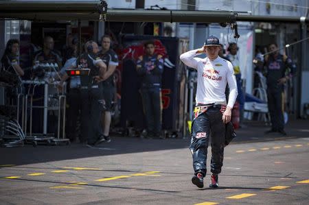 Formula One - Monaco Grand Prix - Monaco - 28/5/16. Red Bull Racing F1 driver Max Verstappen walks back to the pit after his crash during the qualifying session. REUTERS/Andrej Isakovic/POOL