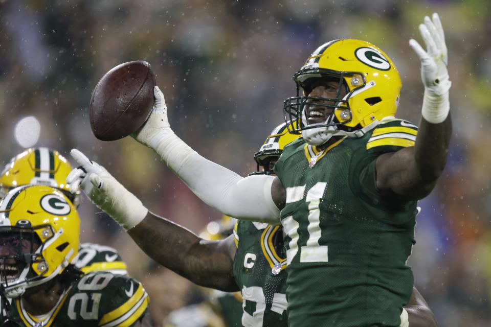 Green Bay Packers' Krys Barnes celebrates a fumble recovery during the second half of an NFL football game against the Detroit Lions Monday, Sept. 20, 2021, in Green Bay, Wis. (AP Photo/Matt Ludtke)