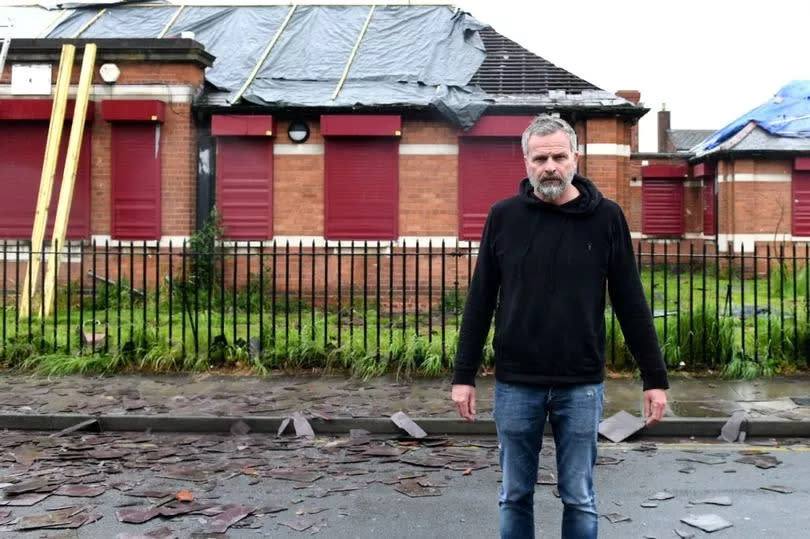 Andrew Brown, Chair of Trustees for Harbour Place, with the tiles thrown during the rooftop stand-off -Credit:Donna Clifford/Grimsby Live