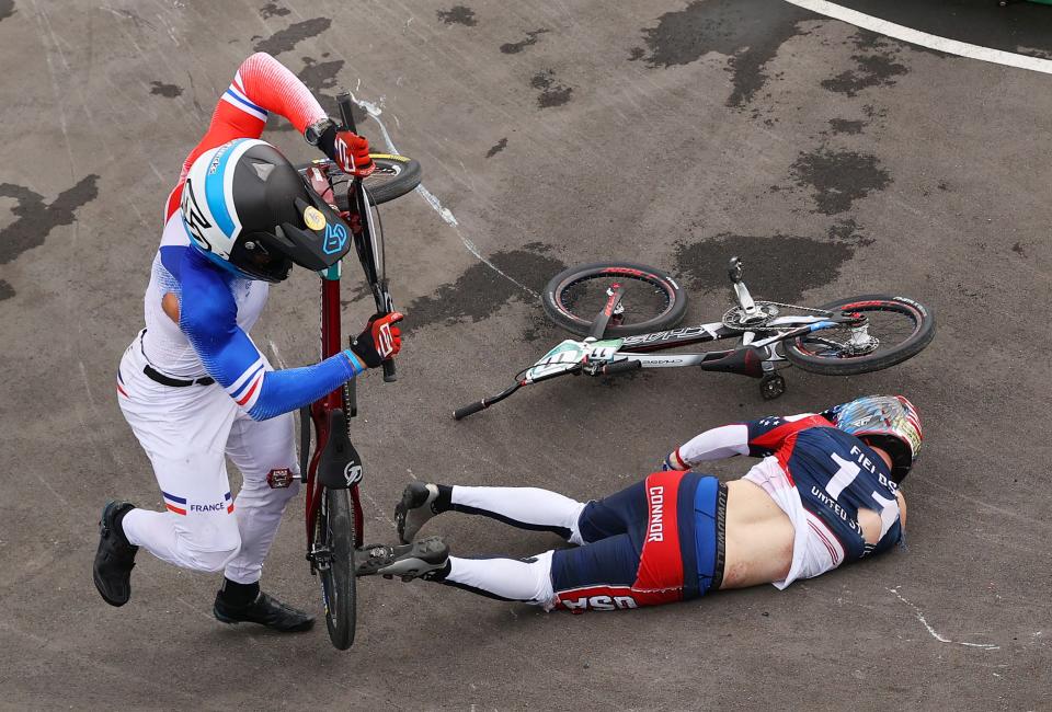 Connor Fields, right, crashed after a collision with France's Romain Mahieu during the Men's BMX semifinal at Ariake Urban Sports Park.